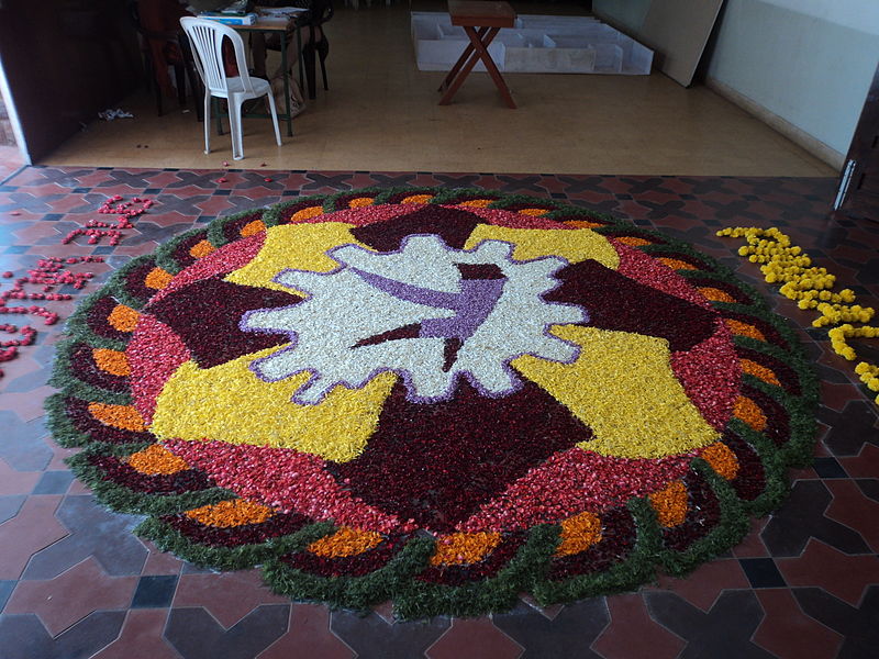 File:An art on the floor by flowers and leaf.1.JPG
