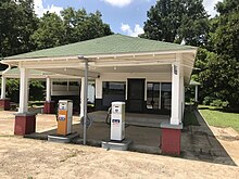 The reconstructed Ben Roy Service Station that stood next to the grocery store where Till encountered Bryant in Money, Mississippi,[233] 2019