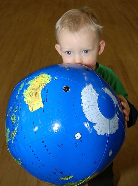 File:Boy with earth.jpg