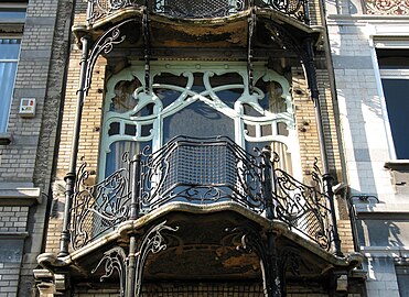 Wrought iron balconies of the Saint-Cyr House by Gustave Strauven (1901–1903)
