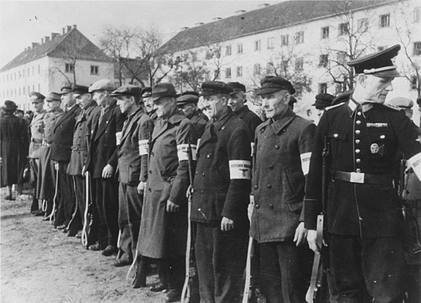 An SS Propaganda Company photograph of Volkssturm, 21 October 1944; only the men on the far left and far right end of the line appear to be uniformed 