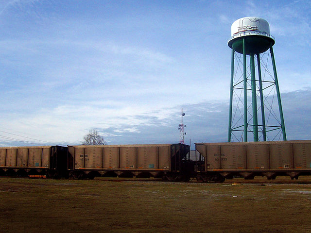 Trains in front of the Conway water tower