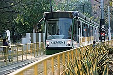 A Melbourne D2-class tram on demonstration in Kaohsiung, Taiwan in January 2004 Ddm 2004 006 Kaohsiung Cable Car on Rail.jpg