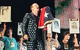 Relatives of missing detainees join U2 onstage during a performance in Santiago, Chile, in 1998