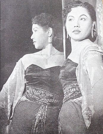 Dhalia in a promotional still for Lewat Djam Malam