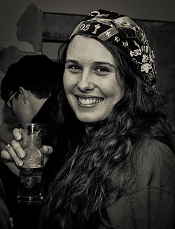 A French student wearing a faluche Falucharde avec verre de biere recadree.jpg