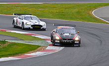 The intense battle for the lead at Silverstone GT-R and DBR9 on track.jpg