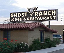 Ghost Ranch Lodge on former SR 84/SR 93 in Tucson. The sign was designed by artist Georgia O'Keeffe. Ghost Ranch Lodge (Tucson) sign from E 1.JPG
