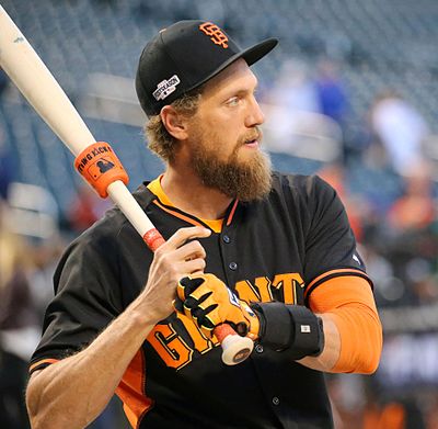 Hunter Pence using a "Hitting Jack-It" weight, a doughnut which allows a player to take batting practice while using it.
