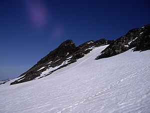 Left the Lenkstein from the snow field southwest of the summit