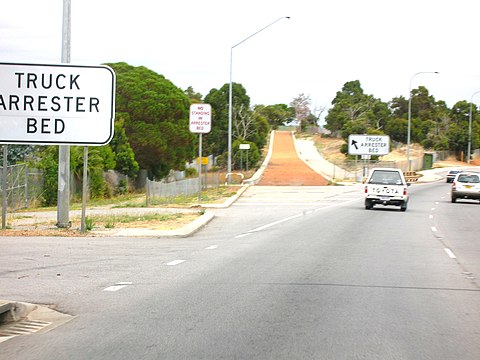 An arrester bed on Great Eastern Highway in Western Australia, located at the bottom of a hill before an intersection