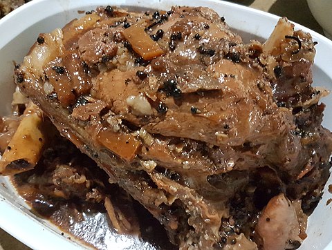Hamonado - pork with pineapples, black peppercorns, bay leaves, soy sauce, garlic, and vinegar (Philippines).jpg