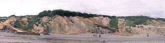 The Headon Formation with Bembridge Limestone Formation to the right and the upper part of the Barton Group to the left in the cliffs of Whitecliff Bay Headon2.jpg