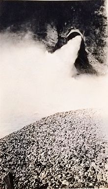 Water flowing out of a spillway at Horse Mesa, circa 1940