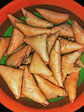 Indonesian-style samosa identified as kue kering.