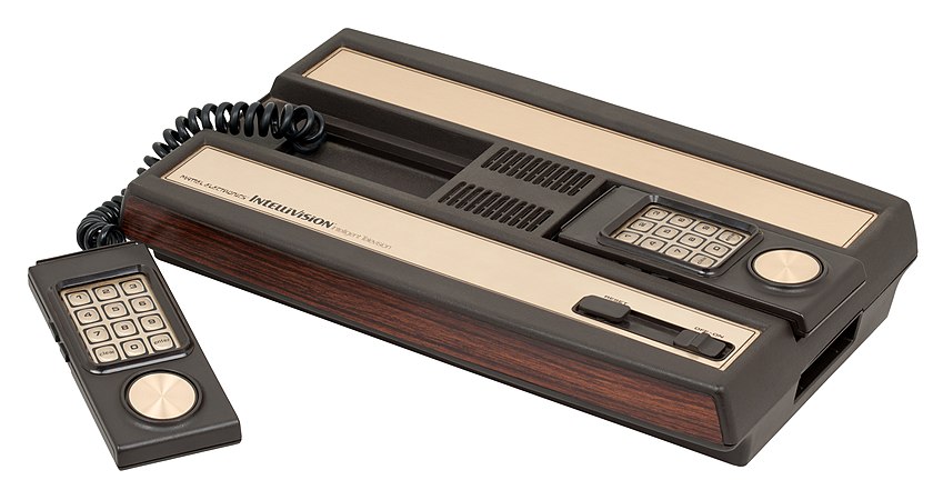 The Intellivision console with one controller extended.