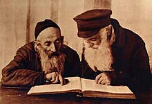 Traditional Jewish life continued in Pinsk (Western Belarus) until WWII. (Photo by Alter Kacyzne, 1924) Kac 1924-10-19 Pinsk jews reading mishnah colored.jpg