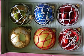 Traditional Polish glass baubles with lace details. Poland is a major exporter of Christmas decorations, especially hand-blown ornaments Koronkowa dekoracja bombek choinkowych - Zbaszyn - 001185c.jpg