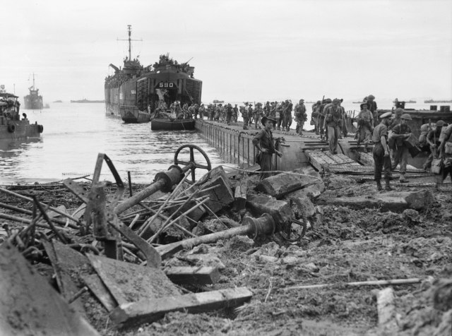 26th Brigade Headquarters landing on Tarakan Island from a LST in May 1945.