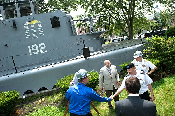 Conning tower of SS-192 on display at Portsmouth Naval Shipyard, seen during a 2013 visit by General Martin Dempsey, then Chairman of the Joint Chiefs