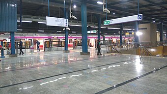Metro in Botanical Garden station of the Magenta line network of Delhi Metro.jpg