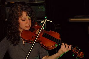 Posen playing violin