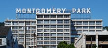 Only two letters of the large rooftop neon sign had to be altered when the building was renamed from Montgomery Ward to Montgomery Park. Montgomery Park, Portland, east facade close-up.jpg