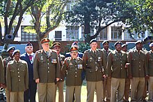 Maj Gen Roy Andersen with the GOC, Brig Gen Deon Holtzhausen, and Sgt Maj of the Formation accompanied by the NFA OC, Major Craig Nel, just after the NFA gunners fired the salute at the Gunner's Memorial Service in Durban 2014 NFA - Gunner's Memorial 2014 02.JPG