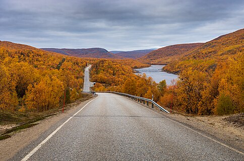 National road 970 and river Teno near Gistugurra, Utsjoki, Lapland, Finland in September 2021.