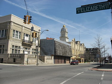 Buildings on North Street: from left to right, the Elks Lodge, a modern building, the tower of the Allen County Courthouse, the Ohio Theatre, and the Metropolitan Block North Street in downtown Lima.jpg