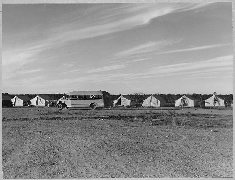 File:One mile south of Eloy, Pinal County, Arizona. School bus returns children to grower's camp in the l . . . - NARA - 522225.jpg