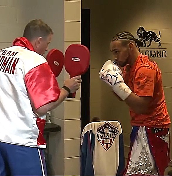Thurman warming up with his trainer Dan Birmingham for the Pacquiao fight.