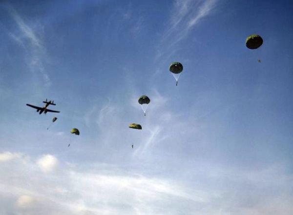 Paratroopers dropping out of a 295 Sqn Whitley, October 1942