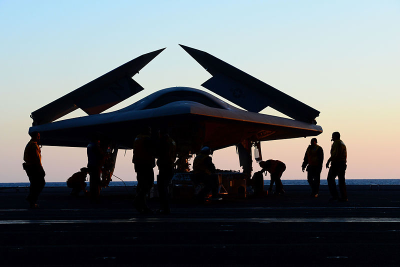 File:Personnel move a U.S. Navy X-47B Unmanned Combat Air System demonstrator aircraft onto an aircraft elevator aboard the aircraft carrier USS George H.W. Bush (CVN 77) May 14, 2013, in the Atlantic Ocean 130514-N-TB177-074.jpg