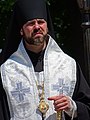 Priest at Ceremony by Ivan Franko Statue - Kolomiya - The Carpathians - Ukraine (27217717261) (2).jpg