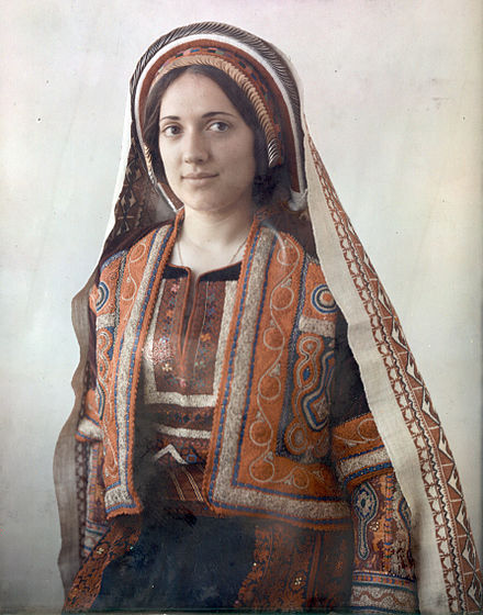 A woman from Ramallah, Palestine in embroidered clothes, 1929–1946