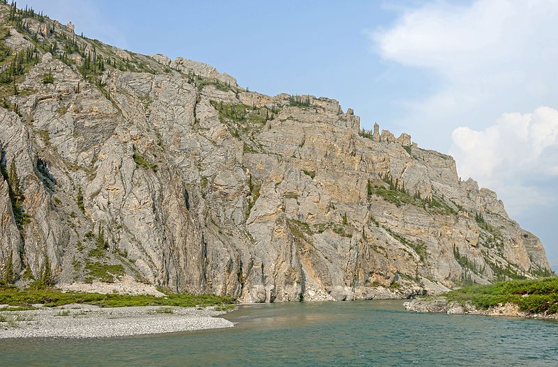 File:Rock face overlooking Firth River at Muskeg Creek confluence, Ivavvik National Park, YT.jpg