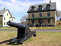 10-inch Rodman gun in front of officers' quarters
