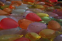 A variety of water balloons placed in water to prevent popping. Sea of water balloons by Slaunger 2009-06-26.JPG