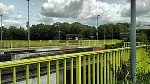 Side platforms surrounding double-tracked railway line