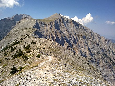 Τhe path in the striking passage Laimou-Ghiosou (location Skourta) with high Olympus' peaks in the background