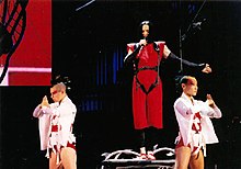 Madonna performing promotional single "Sky Fits Heaven", during the Drowned World Tour in 2001 SkyFitsHeavenDionisio.jpg