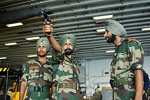 Soldier Sikh LI INF of the Indian Army practices aim during MALABAR 2006.jpg