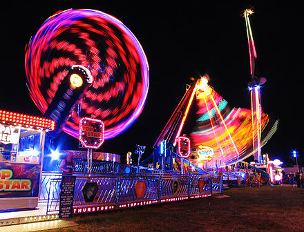 A travelling funfair has many attractions, including adult or  thrill rides, children's rides, and sideshows consisting of games of skill, strength, or luck.