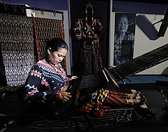 Image 10A Tboli woman weaving t'nalak from South Cotabato. (from Culture of the Philippines)