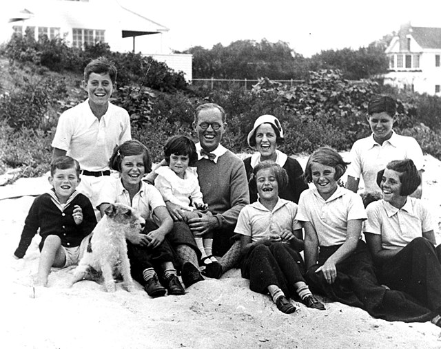 The Kennedy family in Hyannis Port, Massachusetts, with JFK at top left in the white shirt, c. 1931