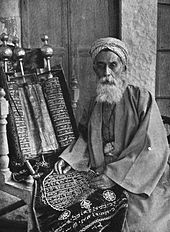 Samaritan High Priest with the Samaritan Torah, Nablus, c. 1920 The High Priest of the Samaritans with the Codex Nablus c. 192.jpg