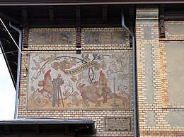 De två tomtemålningarna på fasaden mot Vasagatan