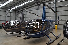 Robinson R44 (left) and R66 (right) VH-YYJ (16490350938).jpg