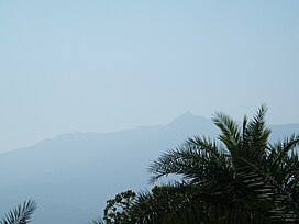 View of shikharji from road towards parasnath railway station.JPG
